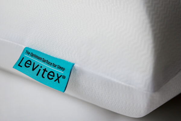 levitex logo close up on a pillow