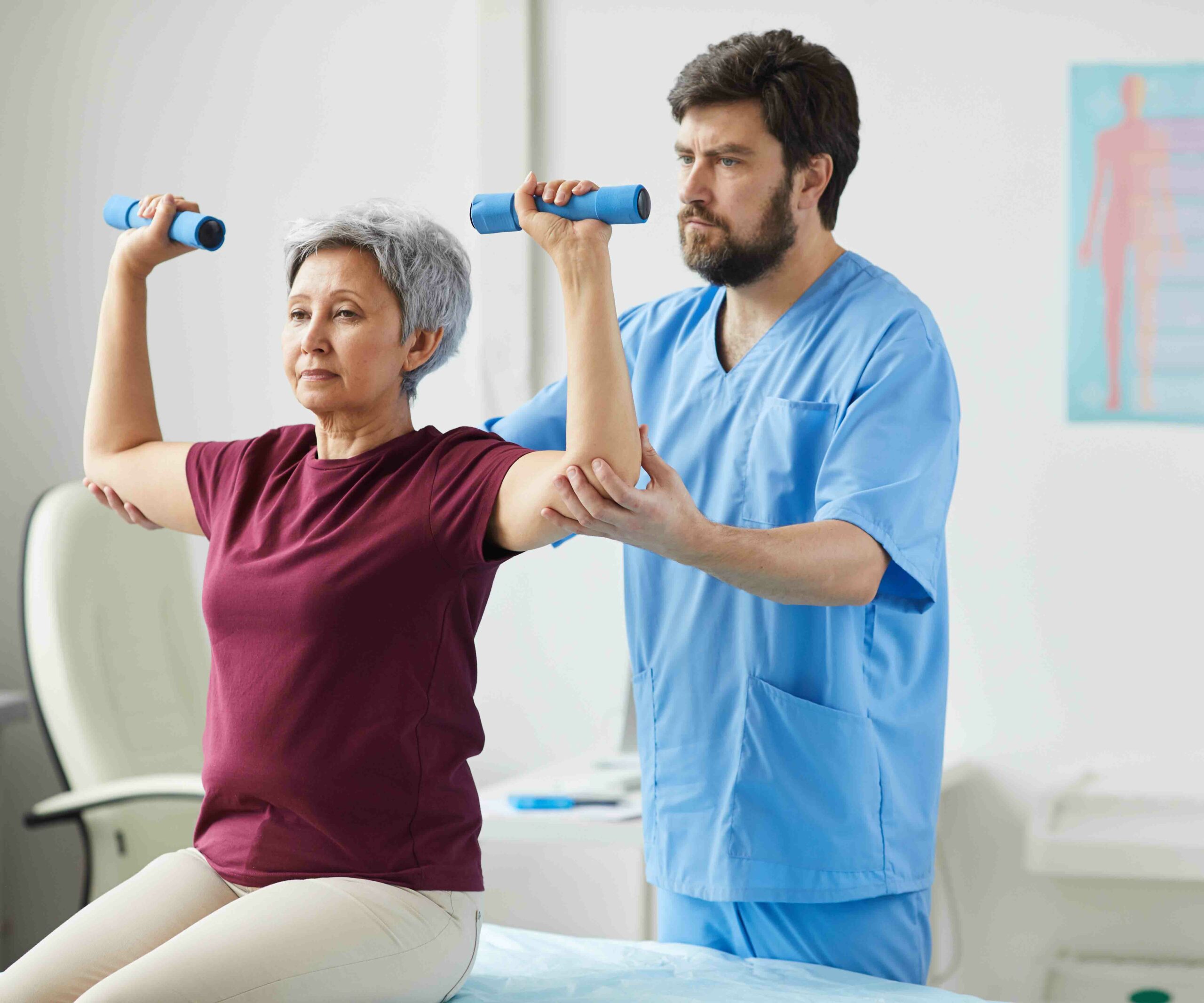 senior woman exercising with a doctor